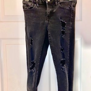 Mid rise ripped black washed jeans